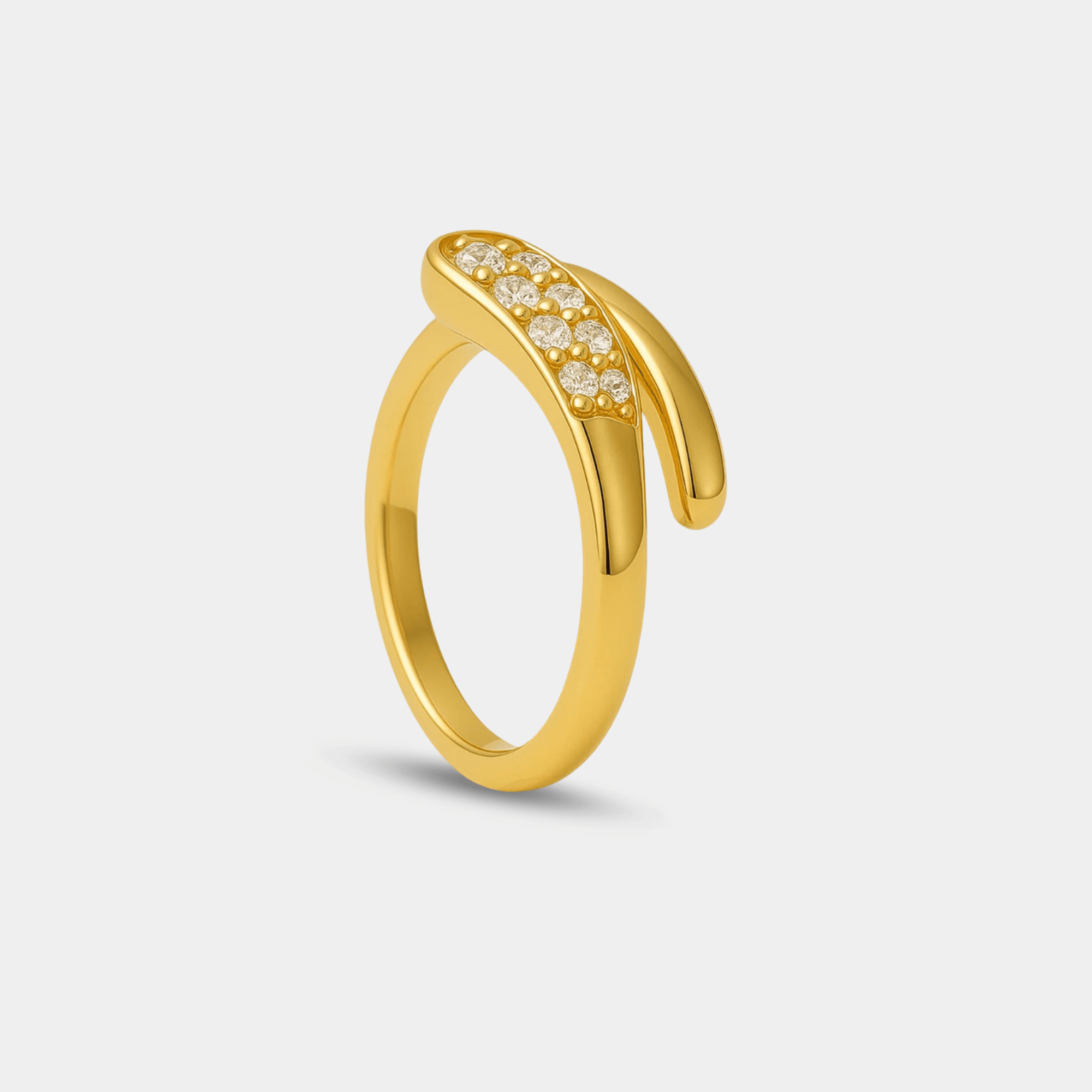Upright side view of the twisted 14K gold plated band and pavé-set zircon stones