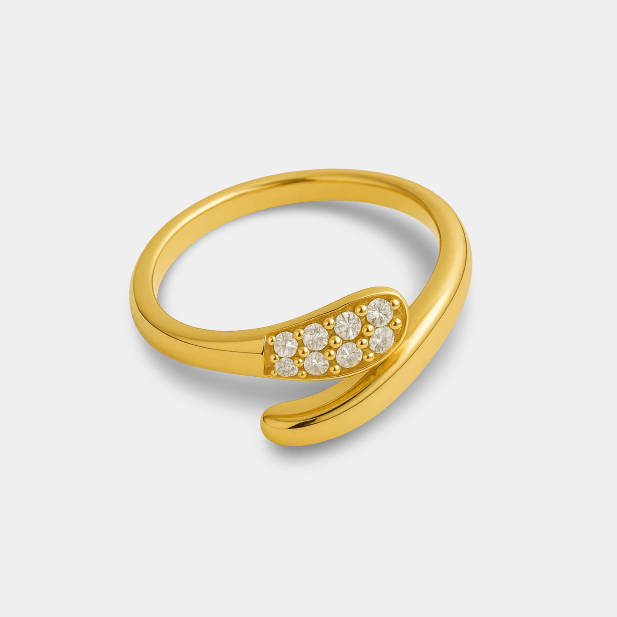 Twist solitaire zircon ring in 14K gold plated stainless steel, angled view of the teardrop pavé cluster of round CZ stones