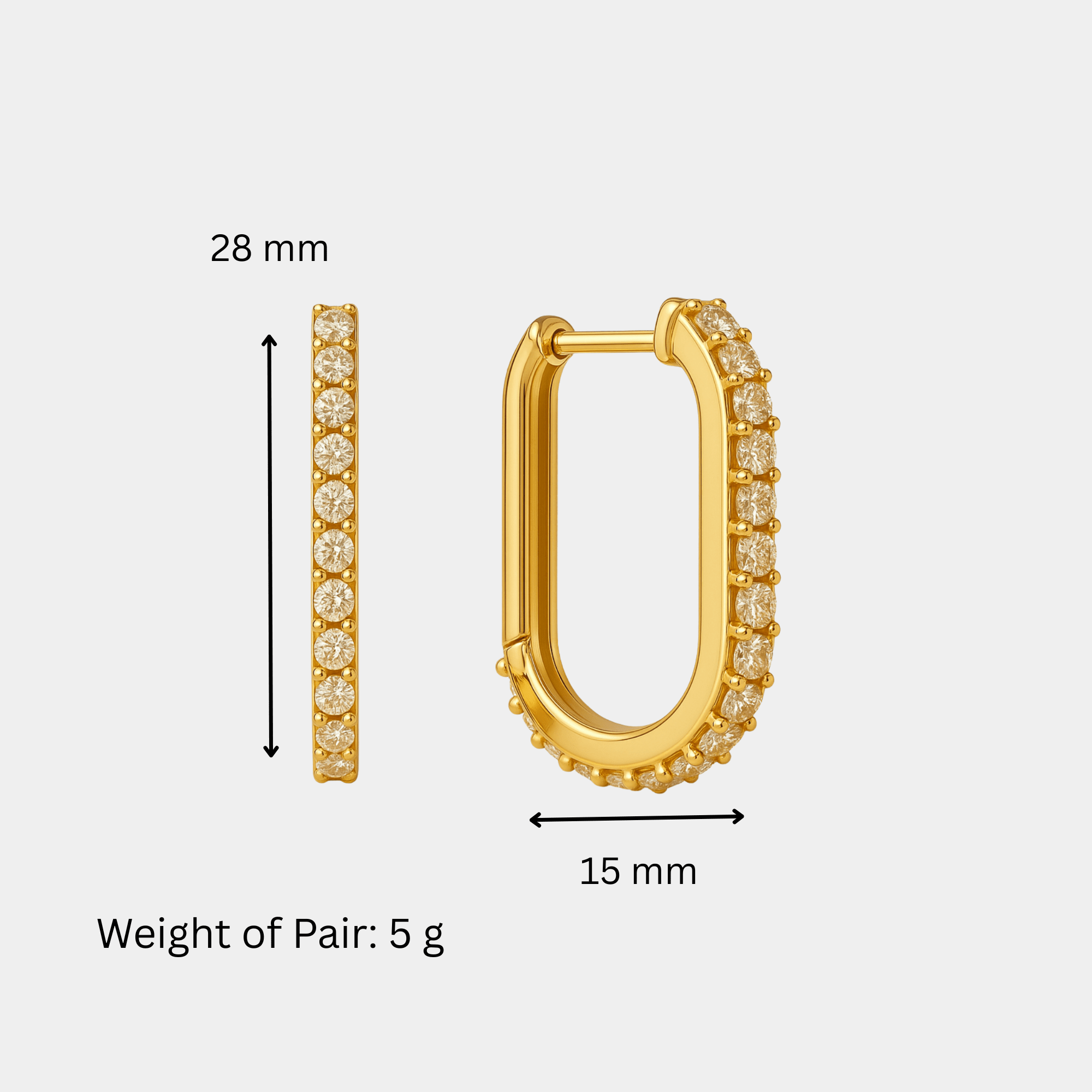 Gold U-shaped huggie earrings shown from the side on an ear