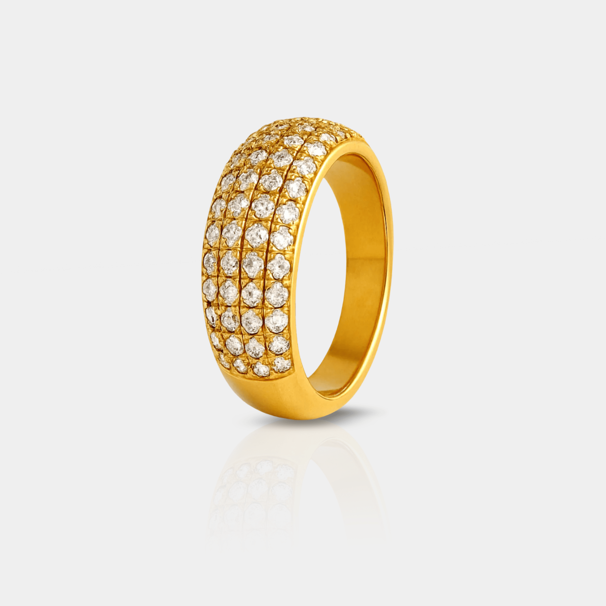 Side profile of the gold dome band showing the pavé CZ stone setting on the Veloura ring