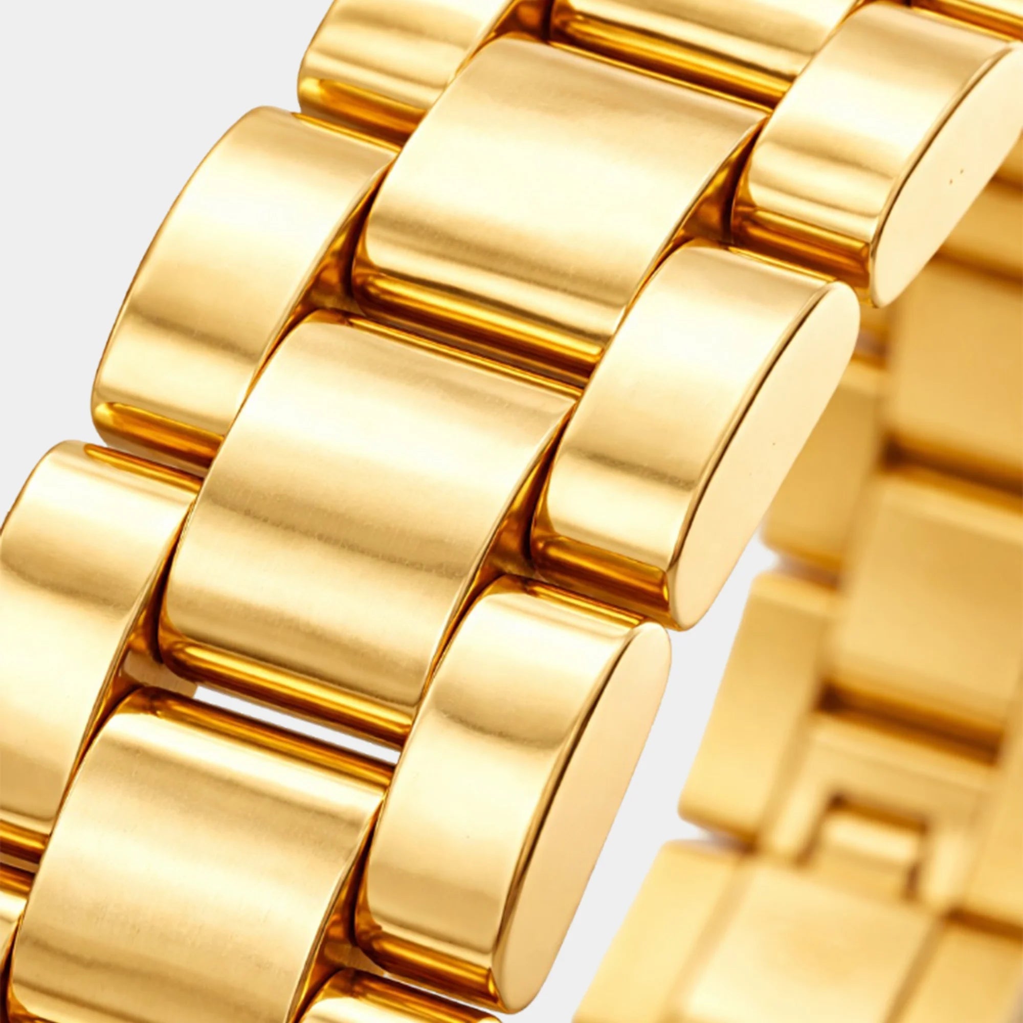 Side view of the gold link bracelet showing its lobster claw clasp